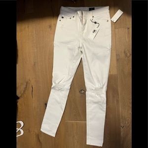 AG - white skinny ankle jeans.